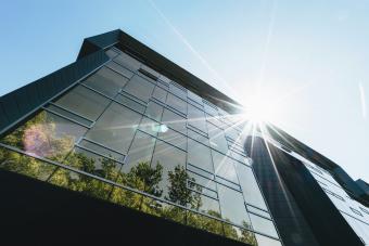 Tall building twinkling in sun