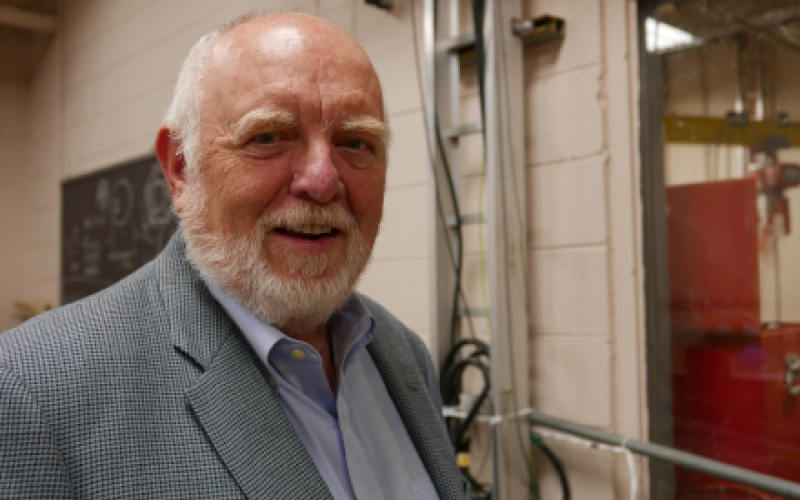 Bob Hebner stands outside a lab