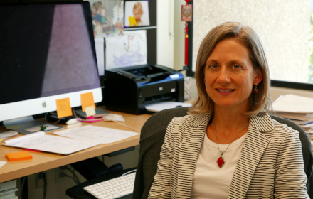 Sheila Olmstead at her desk