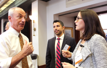 Two students and a professor in dialogue during UT Energy Week 2017